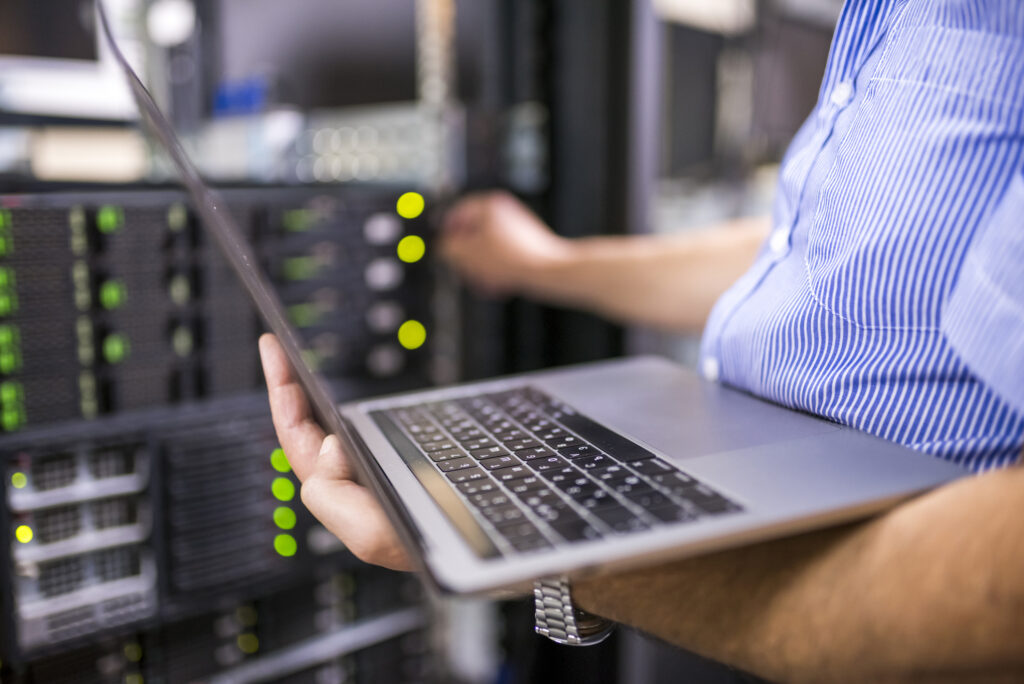 Engineer in the server room close-up